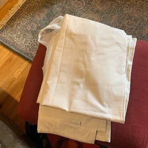 NWOT  2 Brand new curtain panels 84 x 52